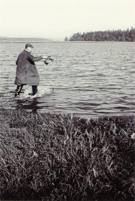Art Hadfield wading into water