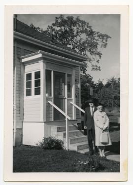 Rev. J. Clifford Jackson and Anne Emery Jackson in front of 868 Old Esquimalt Road