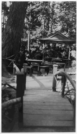 Woman at tea table, Japanese Tea Gardens