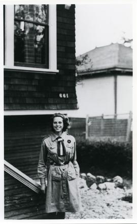 Millie Hughes in Girl Guide uniform in front of 661 Head St.