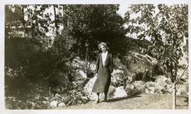 Maude Whittle in her garden, 481 Nelson Street