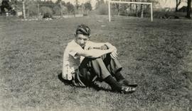 Don Jickling sitting on the grounds of Esquimalt High School