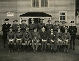 B.C. Provincial Police officers, the Deputy Commisioner, and Attonery General in front of the BC ...