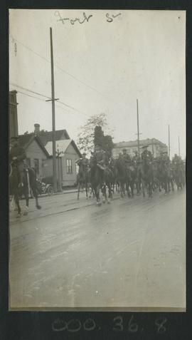 Soldiers on horseback in parade on Fort Street, Victoria