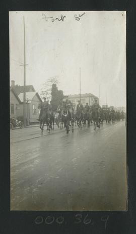 Soldiers on horseback in parade on Fort Street, Victoria