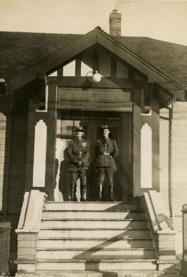 Two B.C. Provincial Police officers, Earl Sarsiat on right