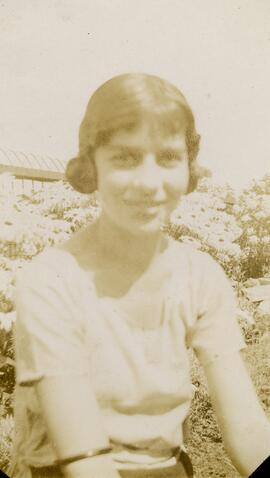 Woman sitting in garden