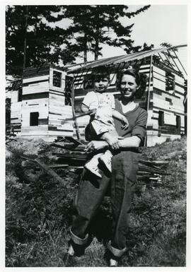 Millie and Kerry Buckley in front of 875 Esquimalt Road