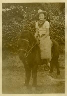 Kathleen (Kay) Crystal riding a pony