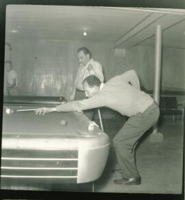 Men playing pool