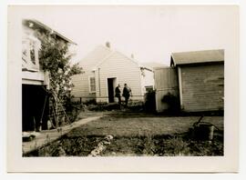 Two men in backyard