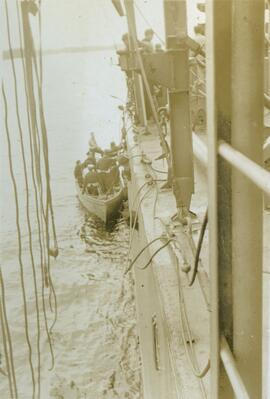 "Shipwrecked people coming aboard, Millbank sound, 1942"