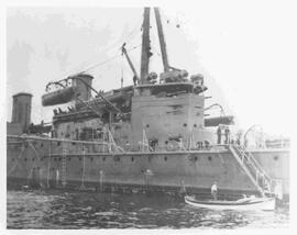HMS New Zealand with motor launch in foreground, July 25, 1913