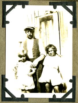 Man with two children