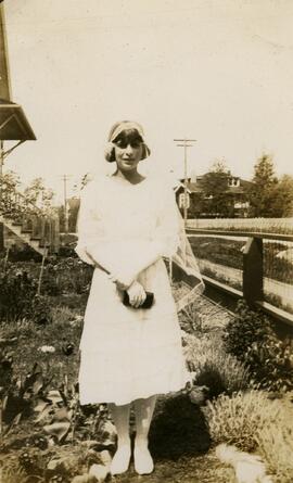Woman in white dress and veil