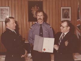 Presentation to Constable Derek A. Reid on February 16, 1978