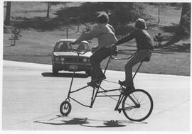 Cyclists on Trick Tandem bicycle