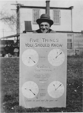 John McAllister with "Terminus" advertisement ca. 1930
