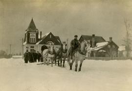 Horse-drawn snowplow clearing Lyall Street