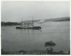 HMS Imperieuse saluting HMS Royal Arthur on relieving command in Esquimalt Harbour