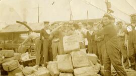 Confiscated liquor being destroyed by Naval personnel during prohibition