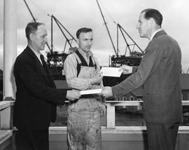 2 Yarrows employees Receiving Envelopes