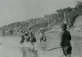 Youth playing on beach