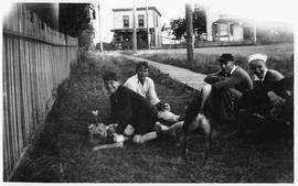 Youths playing near corner of Pioneer Street and Esquimalt Road
