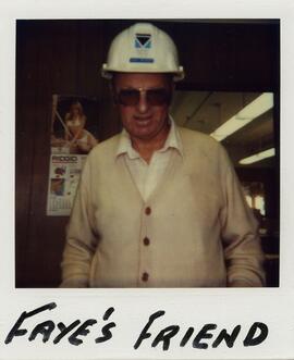 Ken Steer in hard hat with company logo