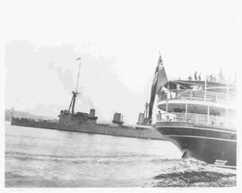 HMS New Zealand behind stern of the Princess Charlotte, July 25, 1913