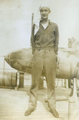 Sailor standing in front of a paravane