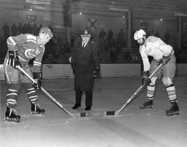 Ceremonial Hockey Face-off with Base Commander
