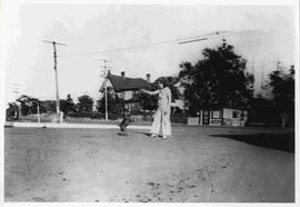 Peggy L. Robinson playing with dog