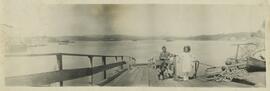 Eric Penty and sister Edna Penty at Foster's Pier, overlooking Esquimalt Harbour