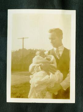 Man holding baby
